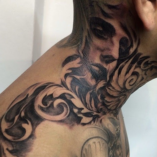 woman's face neck tattoo for men