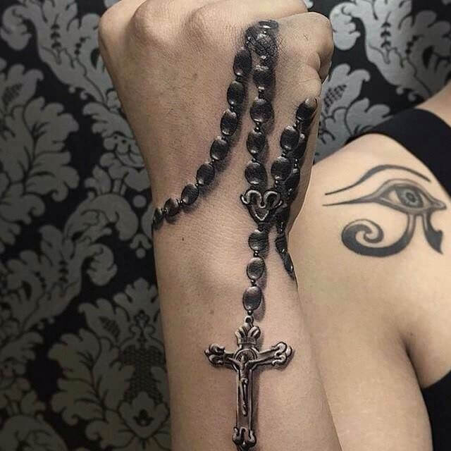 manly cross rosary tattoo
