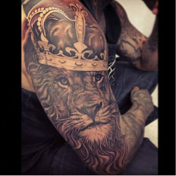 king of the jungle crowned lion tattoo