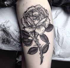 roses on arm tattoo