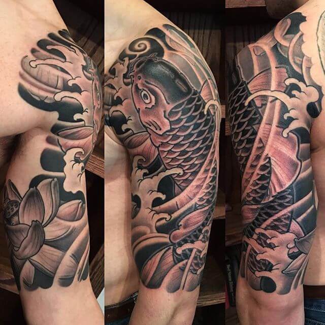 Black-Ink-Japanese-Koi-Fish-Tattoo-On-Man-Left-Half-Sleeve
