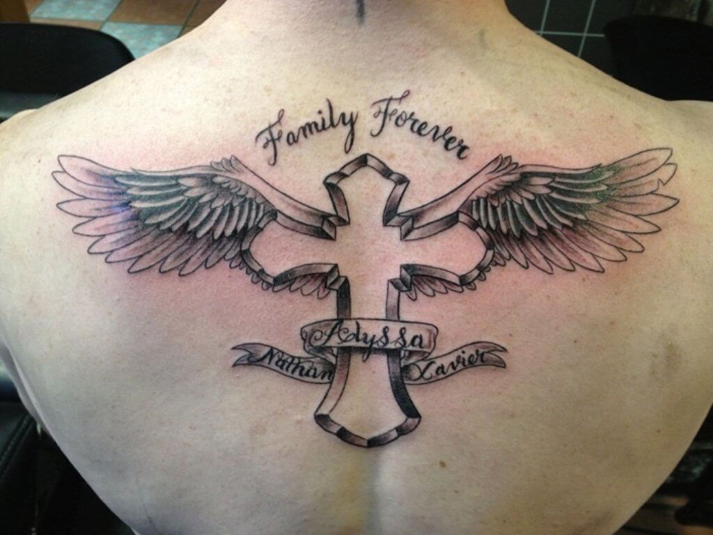 cross and wings tattoo on back