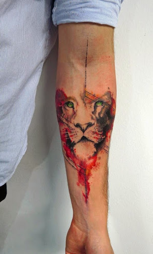 Small-Watercolor-Lion-Tattoo-On-Forearm-1