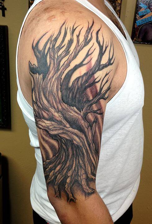 black and grey tree tattoo half sleeve