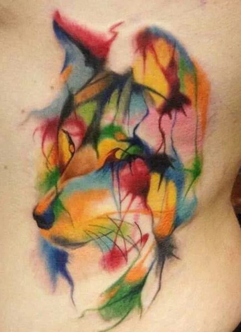 colorful-wolf-watercolor-tattoo-on-back-