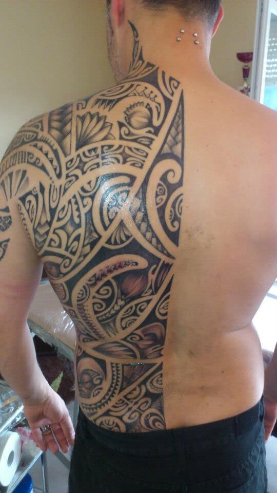 half back tribal design tattoo