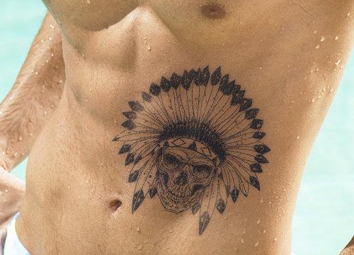 man-with-an-indian-skull-tattoo-on-abs
