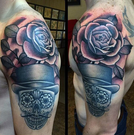 awesome-rose-shoulder-tattoo-on-man-with-sugar-skull-design
