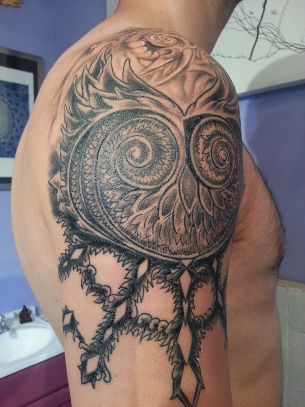 abstract owl tattoo design for men