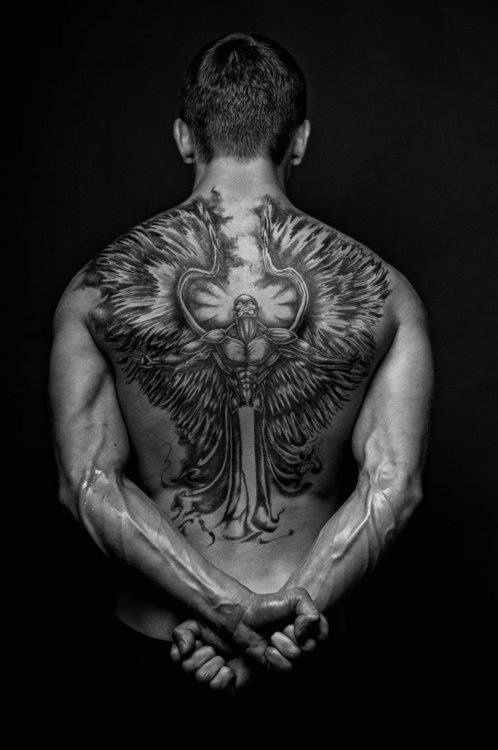 angel with spread wings tattoo for men