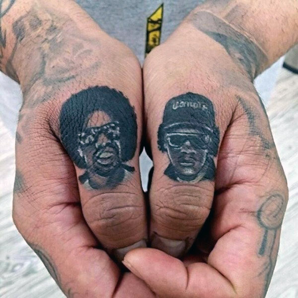 artist portrait finger tattoos for men