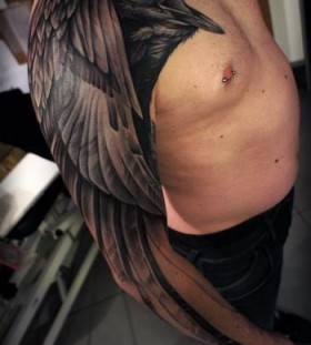 aweseome chest and arm wing tattoo for men