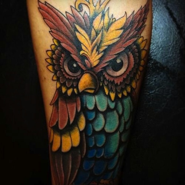 colorful owl men's forearm tattoo