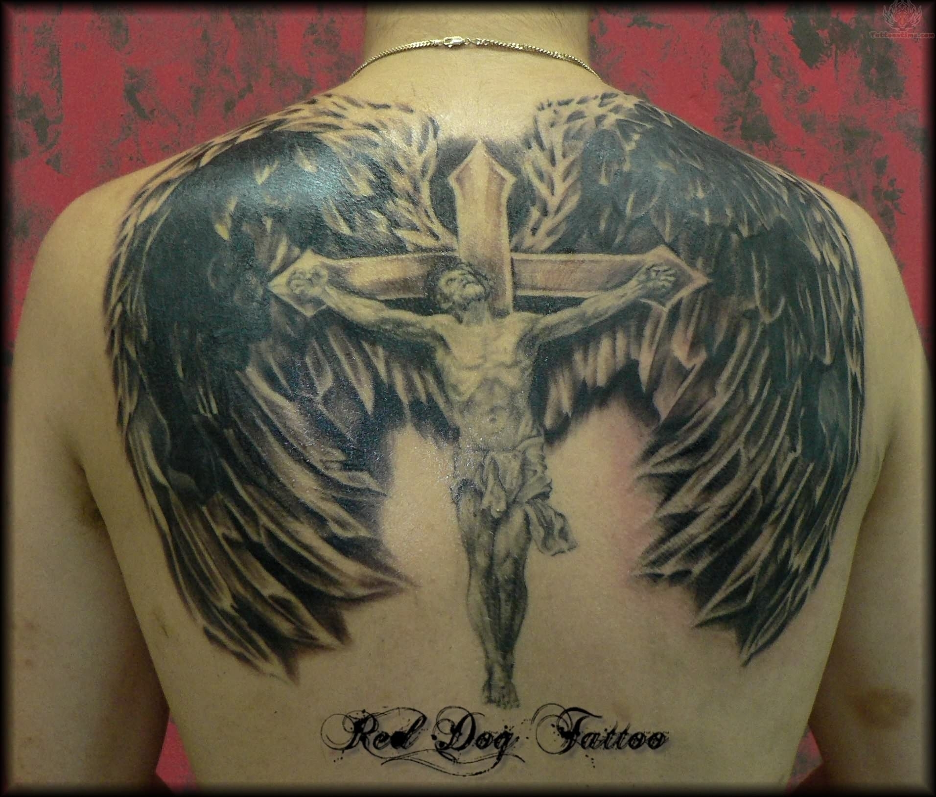 crucified christ against wings tattoo for men