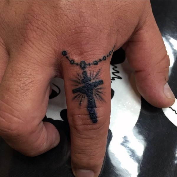 crucifix finger tattoo for men