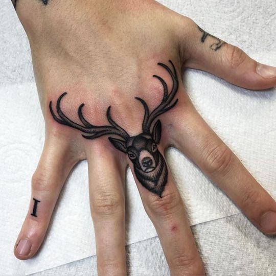 deer finger tattoo for men