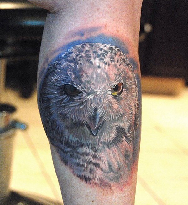 detailed owl face tattoo for men