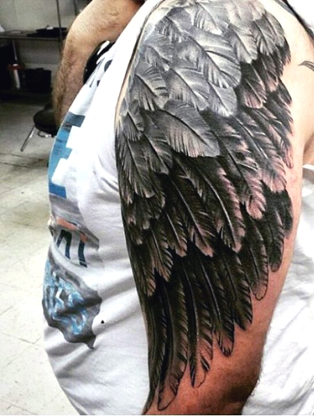 detailed shoulder and arm wing tattoo for men