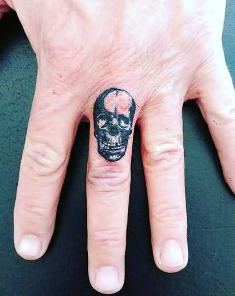 detailed skull finger tattoo for men