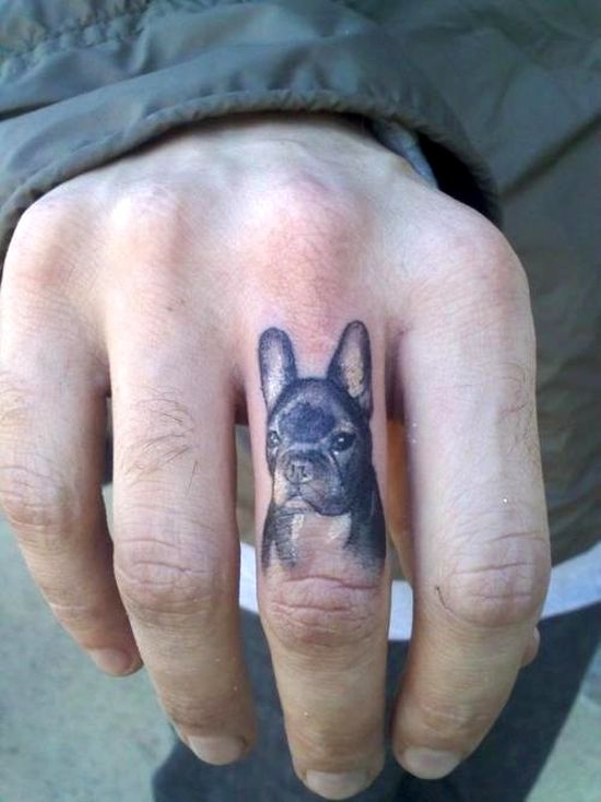 dog finger tattoo for men
