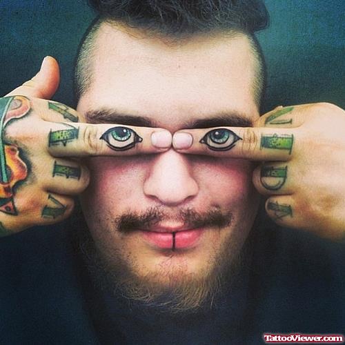 eyes finger tattoos for men