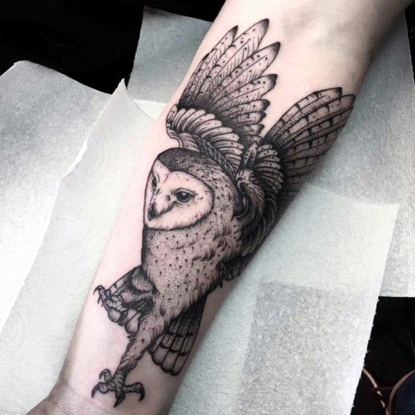 flying owl men's forearm tattoo