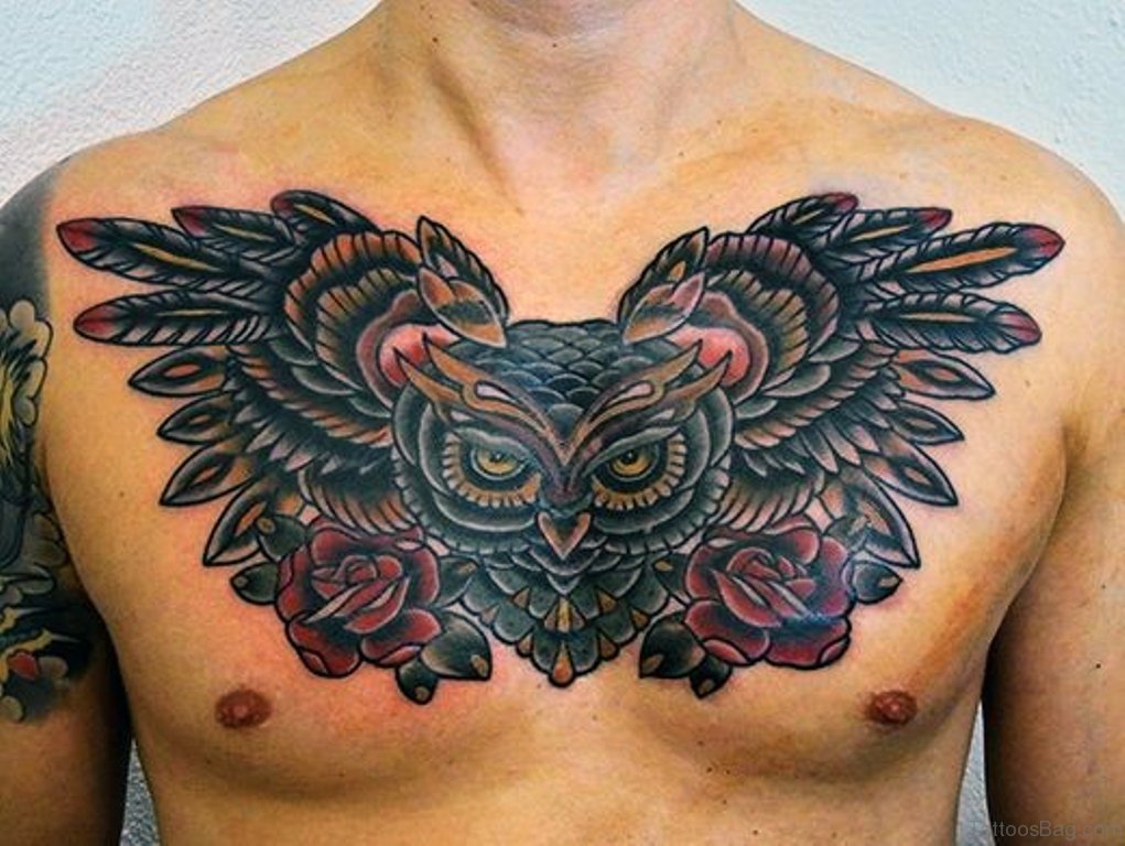 fully colored owl and rose men's chest tattoo