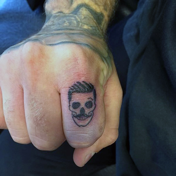 funny skull finger tattoo for men