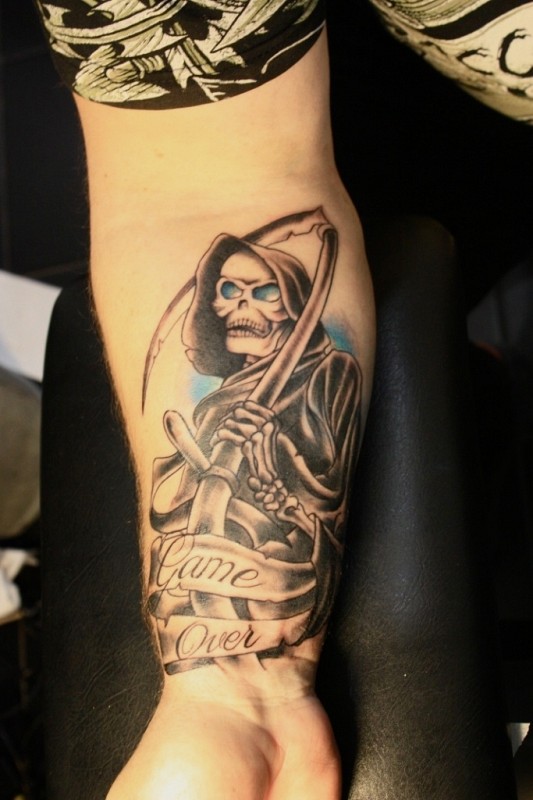 game over forearm grim reaper tattoo for men