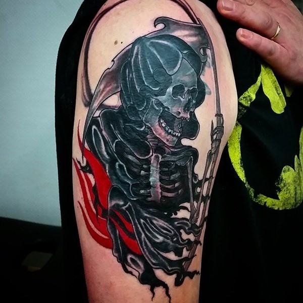 grim reaper with red accents tattoo for men