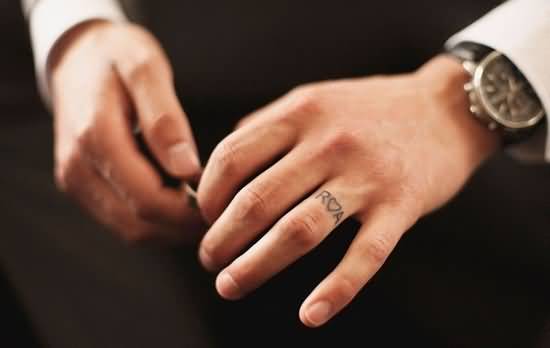 initials wedding ring finger tattoo for men
