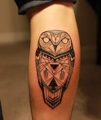 interesting owl design tattoo for men's arms