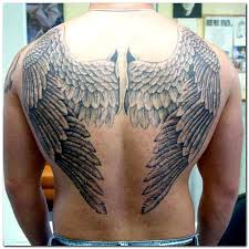 intricate wing tattoo for men