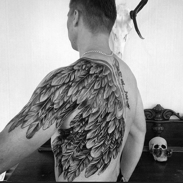 large wing tattoo for men's backs and arms