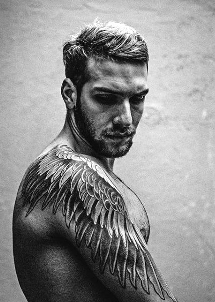 layered shoulder and arm wing tattoo for men