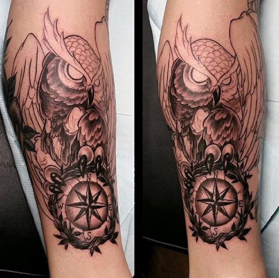 owl on compass men's leg tattoo