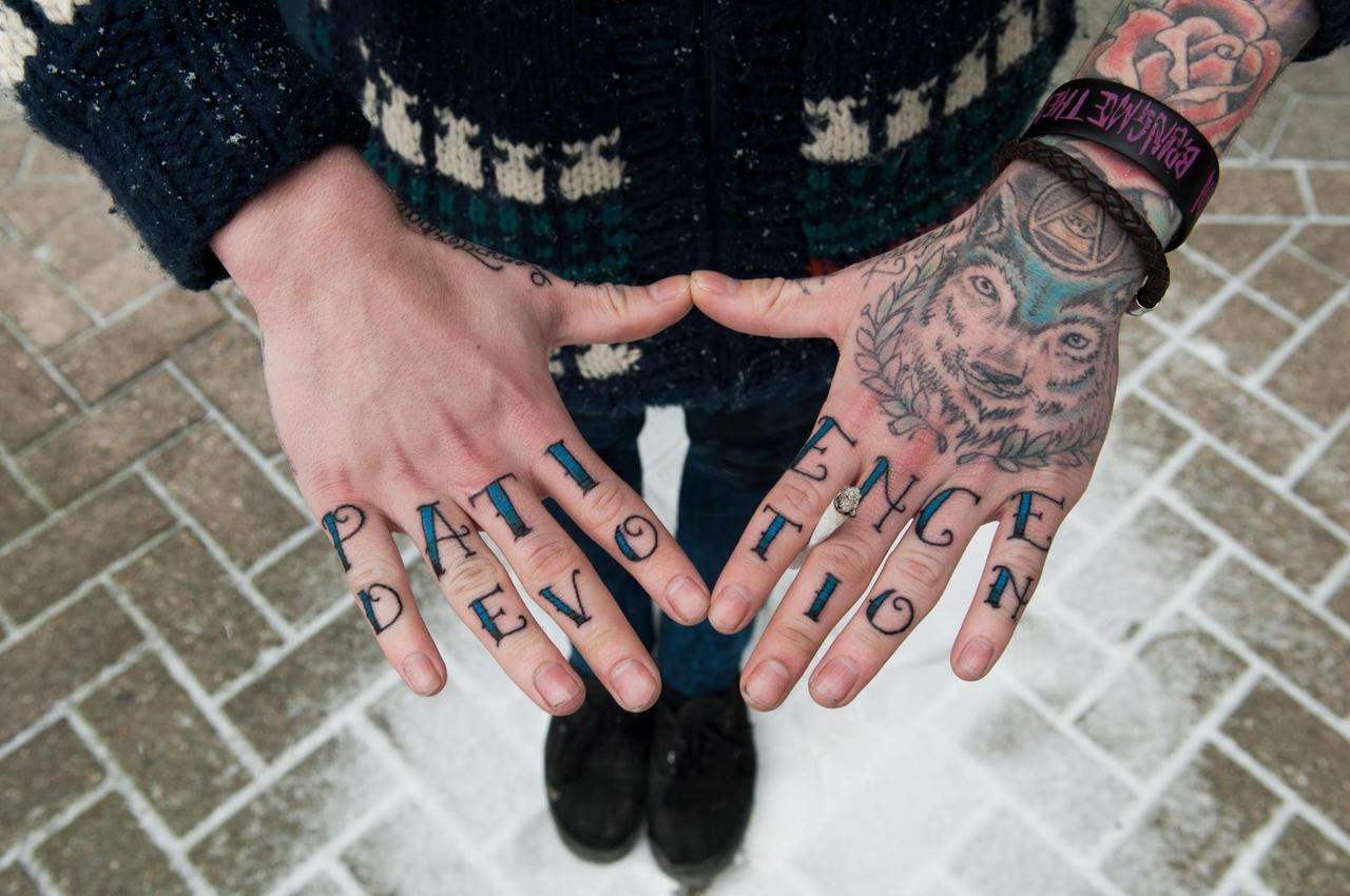 patience and devotion finger tattoos for men