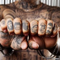 portrait finger tattoos for men