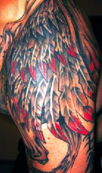 red-tipped wing tattoo for men