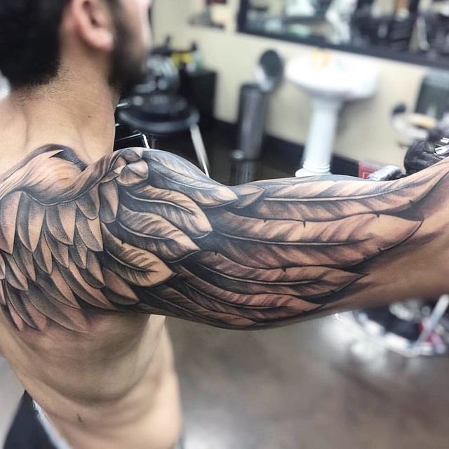 shoulder and arm wing tattoo for men