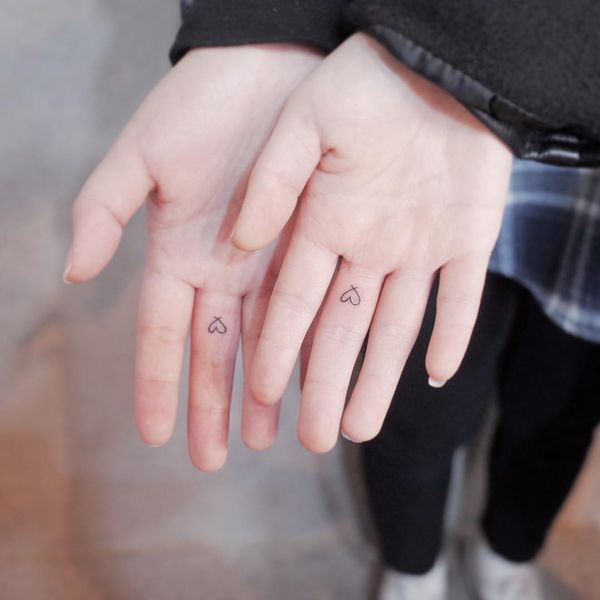 simple wedding ring finger tattoos for man and woman