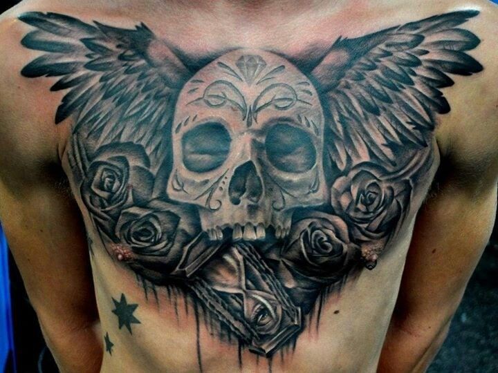 skull and wings tattoo for men