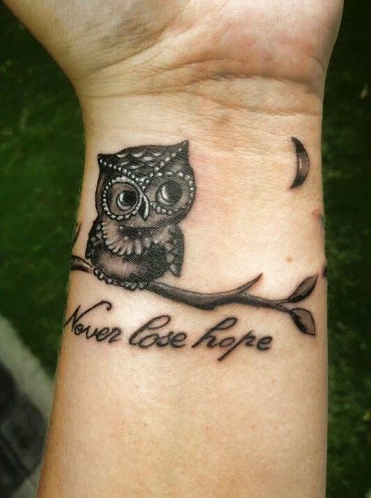 small owl tattoo for men's wrists