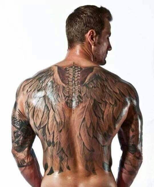 spine and wings tattoo for men