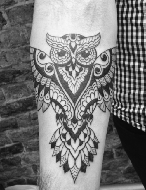 stylized spread wing owl tattoo for men's forearms