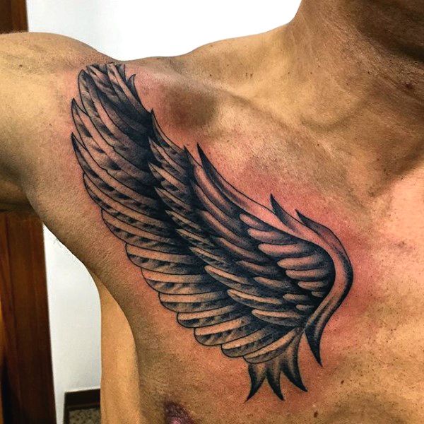 upper chest wings tattoo for men