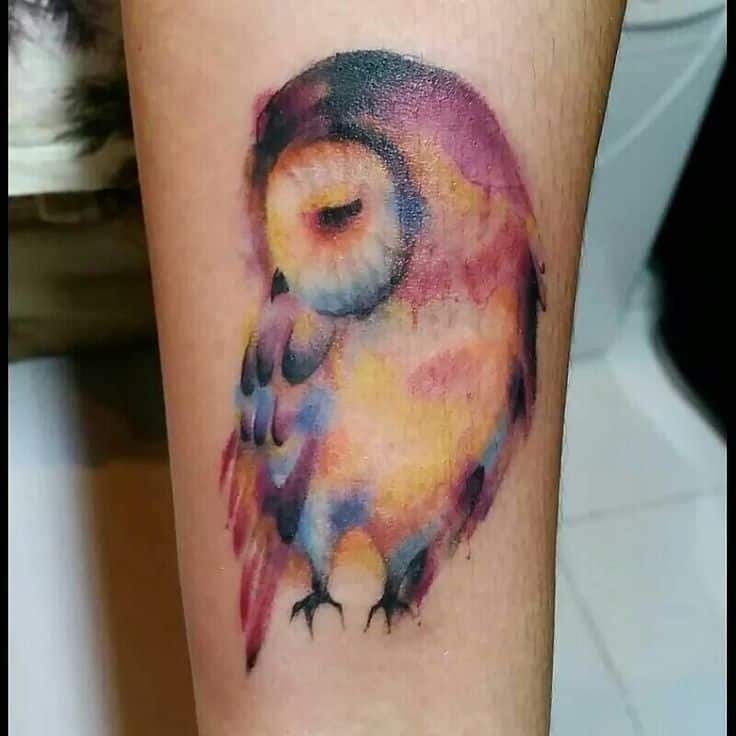 watercolor owl tattoo for men's forearms