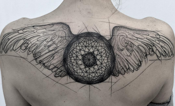 wing and geometric design tattoo for men
