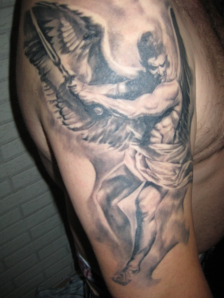 attacking guardian angel tattoo for men