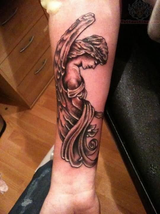 bowing guardian angel tattoo for men